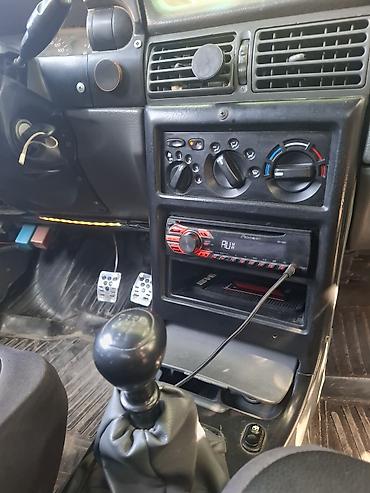 Daewoo: Model: Daewoo Nexia sedan Kuzov: 4 qapılı, ağ rəng Yanacaq: Benzin — 11
