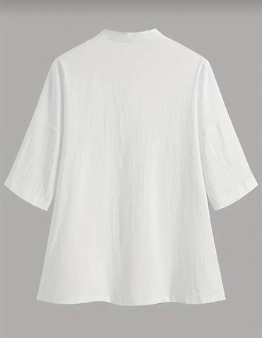 sortlar: 100% pambiq. Ağ rəngli, qısaqol, oversize kəsimli köynək. Minimalist — 3