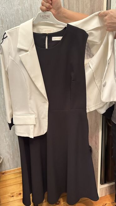 Dəstlər, kostyumlar: Qara rəngdə zərli və mirvari bəzəkli iki hissəli dəst: - Üst: qısa — 4