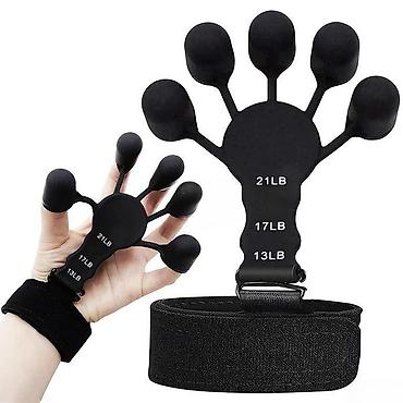İdman və istirahət: Barmaq espanderiTəsvir ; Barmaq Espanderi (Finger Expander) əllərin və — 2