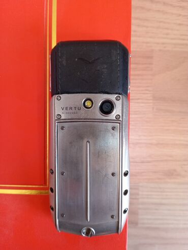 телефон fly nimbus 1: Vertu Ti, 2 GB, цвет - Серебристый, Кнопочный