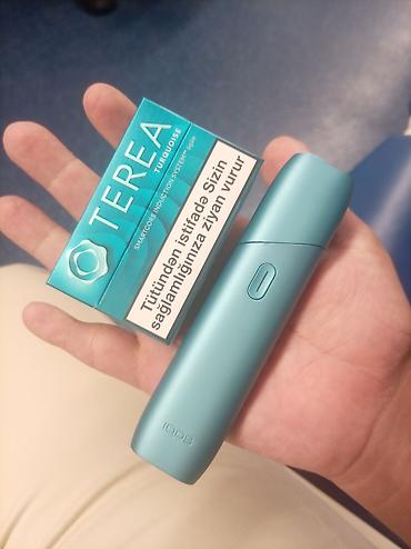 baş: IQOS iltihab etmədən tütün qızdırma cihazı – turkuaz rəng - Model — 2