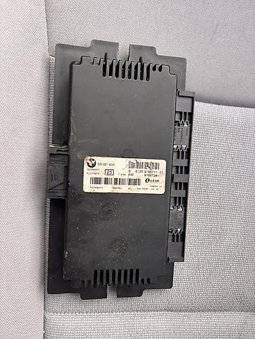 h55be7000: BMW modul / upravljačka jedinica za elektroniku vozila. Na nalepnici — 1