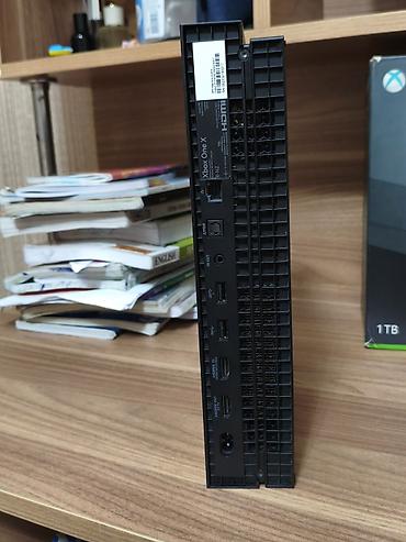 xbox seris x: Xbox One X 1TB oyun konsolu Xüsusiyyətlər: - 1TB daxili yaddaş – — 5
