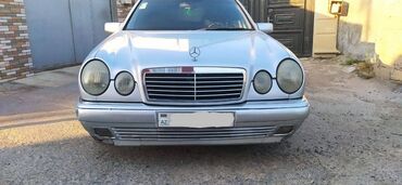 Mercedes-Benz: Mercedes-Benz E 300: 3 l | 1995 il Sedan