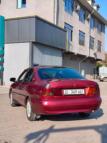 нексия сиденья: Mitsubishi Carisma: 1998 г., Седан — 2
