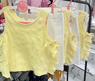 ponço nədir: Uşaq qız üçün yay dəsti – sarı qolsuz top və ağ şort - Top: yumşaq — 1