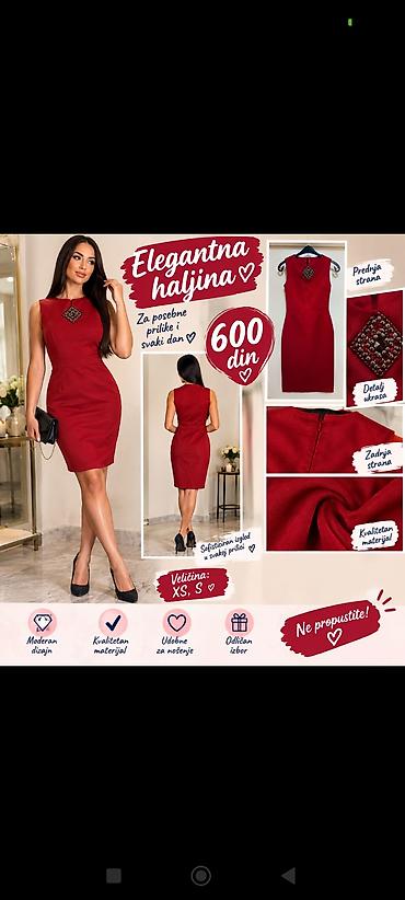 Elegantna crvena haljina bez rukava, kroja koji prati liniju tela