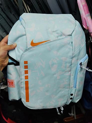 dlivery bag: Рюкзак Nike (голубой с абстрактным светлым камуфляжем и оранжевыми — 1
