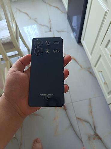 Xiaomi Redmi Note 13 – şık qara rəngdə smartfon. Texniki