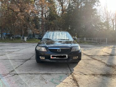 Mazda: Mazda 323: 2002 г., 1.6 л, Механика, Бензин, Хэтчбэк — 3