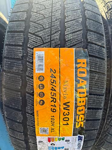 45000: Зимняя китайская шина. Фирма Roadboss made in China. Размер задних — 2