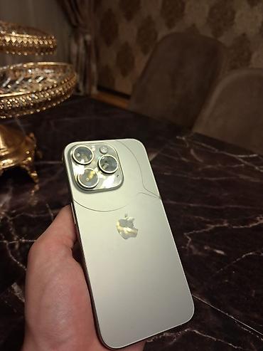 kaburolar: IPhone 15 Pro, 128 GB, Natural Titanium, Face ID — 2