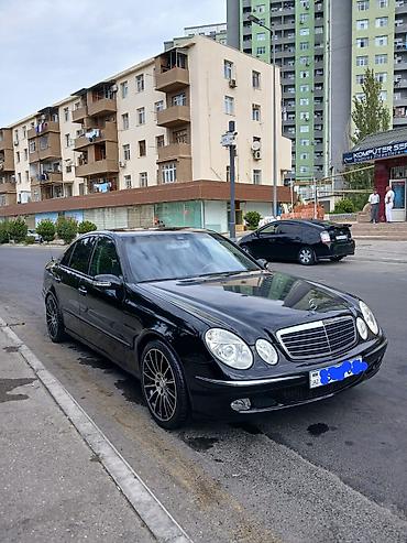 320: Mercedes-Benz E 320: 3.2 l | 2003 il Sedan — 1