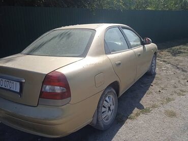 Daewoo: Daewoo Nubira: 1999 г., 1.5 л, Механика, Бензин, Седан