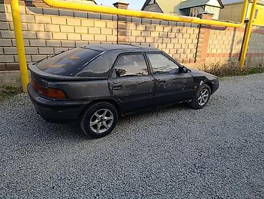 форт фокус дизель: Mazda 323: 1991 г., 1.6 л, Автомат, Бензин, Хэтчбэк — 9