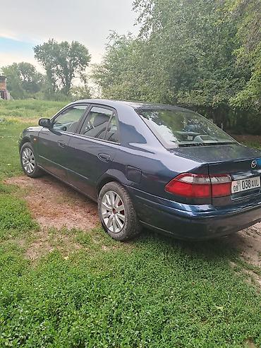 smart plus: Mazda 626: 1997 г., 1.8 л, Механика, Седан — 10