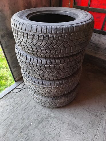 шины для погрузчиков: Комплект зимних шин (4 штуки) без дисков. - Назначение: зима