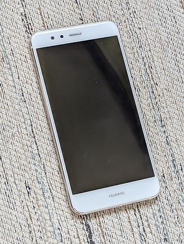 poco 1: Huawei P10 Lite, Б/у, 32 ГБ, цвет - Белый, 2 SIM — 1
