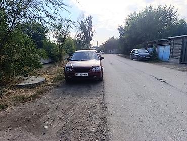 demio sport: Mazda 323: 2001 г., 1.8 л, Автомат, Бензин, Седан — 1