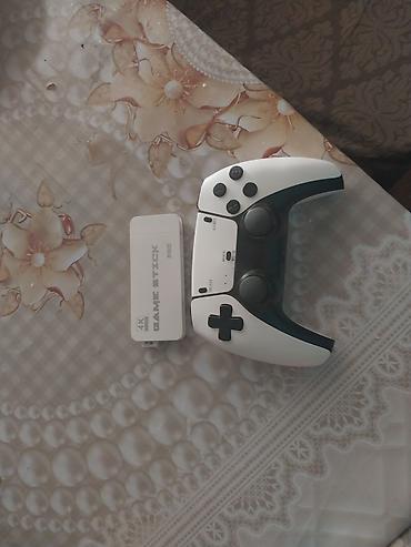kontakt iphone 17 pro max: GAME STICK PRO 4K retro oyun konsolu və simsiz oyun pultu - TV-yə — 1