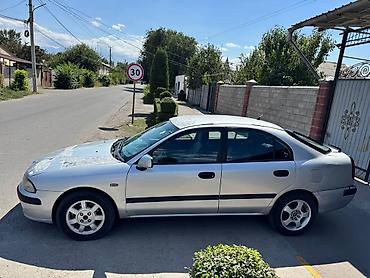 на 124: Mitsubishi Carisma: 2000 г., 1.9 л, Автомат, Бензин, Седан — 4