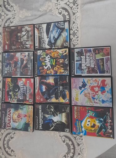 plesteyşn: Playstation2 qarişiq janr və futbol oyunlari tek satilmir hamisi