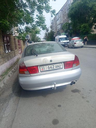byd e2 2024: Mitsubishi Carisma: 2003 г., 1.8 л, Механика, Бензин, Седан — 3