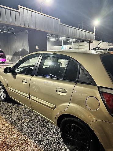 Roewe: Kia Rio: 2011 г., 1.4 л, Автомат, Бензин, Хэтчбэк — 2