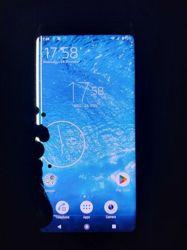 Другие мобильные телефоны: Смартфон с изогнутым AMOLED‑дисплеем и разъёмом USB‑C. Особенности: - — 1