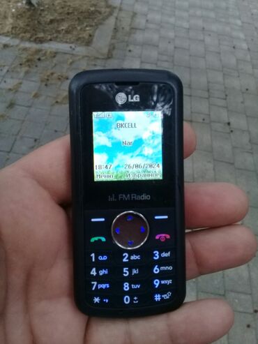 samsung not telefonlar: LG K10, rəng - Qara, Düyməli