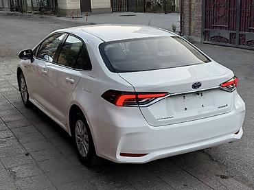 Toyota: Toyota Corolla: 2021 г., 1.8 л, Вариатор, Гибрид, Седан — 5