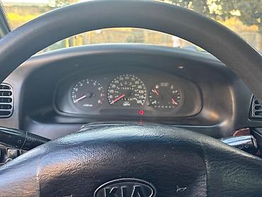mustan: Kia Sportage: 2 l | 1999 il Ofrouder/SUV — 5