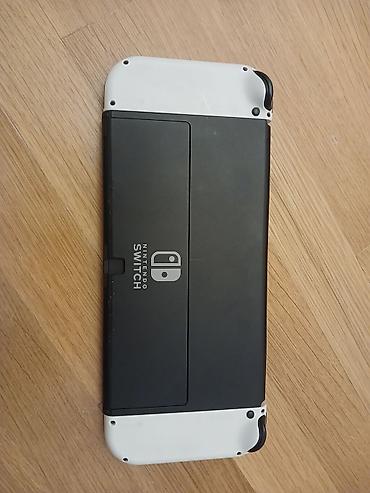 nintendo switch lite: Nintendo Switch komplekti - Konsol: Nintendo Switch (arxa hissə — 1