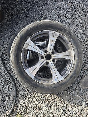 т 28 х4: Литой диск с шиной 225/65 R17 - Диаметр диска: 17" - Материал — 1