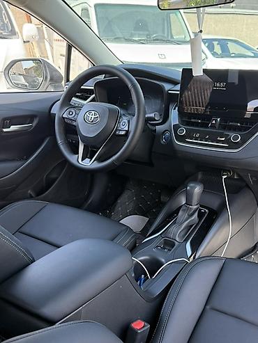 byd e6: Toyota Corolla: 2023 г., 1.8 л, Гибрид, Седан — 7