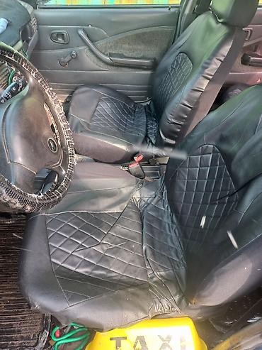 Daewoo: Daewoo Nexia: 2004 г. — 9