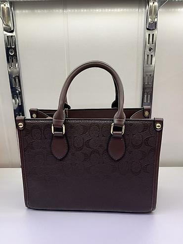 nike elite bag: Сумка Coach (брендовый логотип на лицевой стороне) - Модель — 2