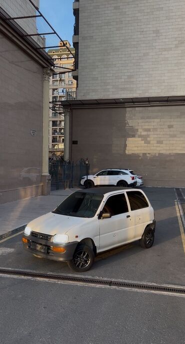 авто в рассрочку без первоначального взноса: Daihatsu Cuore: 1997 г., 0.8 л, Механика, Бензин, Хетчбек