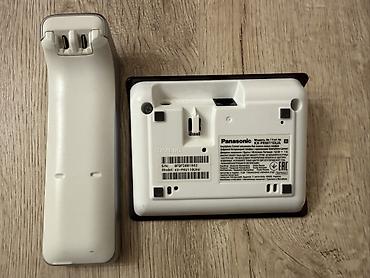 philips xenium 9@9u: Panasonic KX-PRW110UA simsiz ev telefonu və baza stansiyası (az — 3