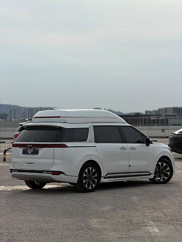 Kia: Kia Carnival: 2022 г., Минивэн — 14