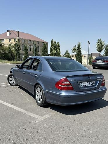 cls 63 amg: Mercedes-Benz E 200: 2 l | 2004 il Sedan — 5