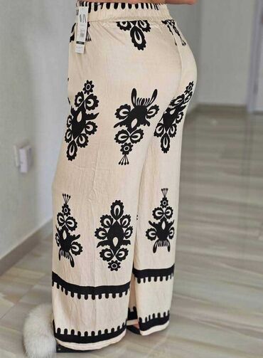 Pantalone: 06. Pantalone 
M/L i Xl/2xl — 23