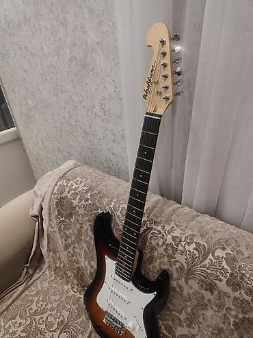 gitara elektro: 1 ildir alinmisdir, usaq istifadə edə bilmədiyindən təcili satilir — 6