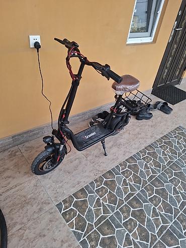 skuter motor elektrik: Elektrik skuter – oturacaqlı, səbətli model Xüsusiyyətlər: - Güclü — 2