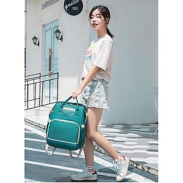 Спортивные сумки: Сумка-рюкзак трансформер для мамы с кроваткой Baby Mom +бесплатная — 7