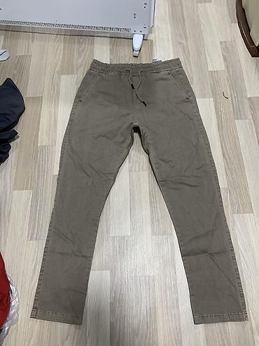 lining s: Мужские брюки Lacoste Подойдет для роста 170-175 - Модель — 1