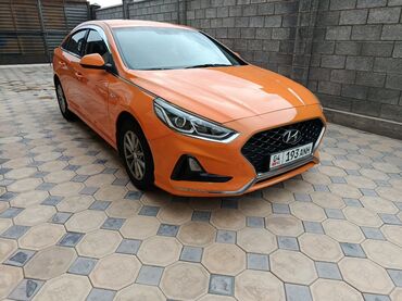 двигатель соната: Элегантный седан Hyundai Sonata яркого оранжевого цвета. Автомобиль