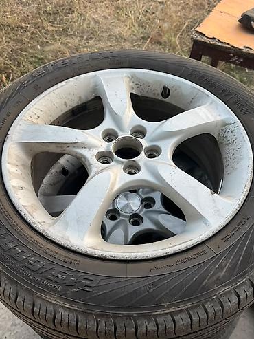 r17 215 60: Литой диск с шиной 17" - Диаметр диска: 17" - Разболтовка: 5 — 3