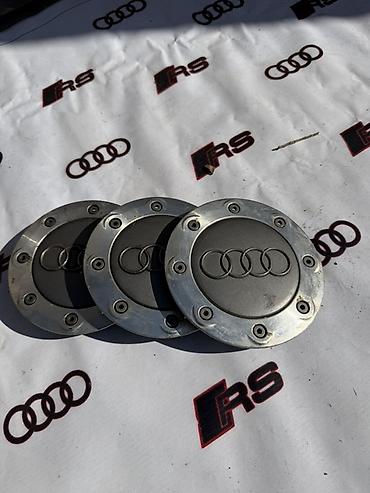 Колпачки (центральные заглушки) на диски Audi